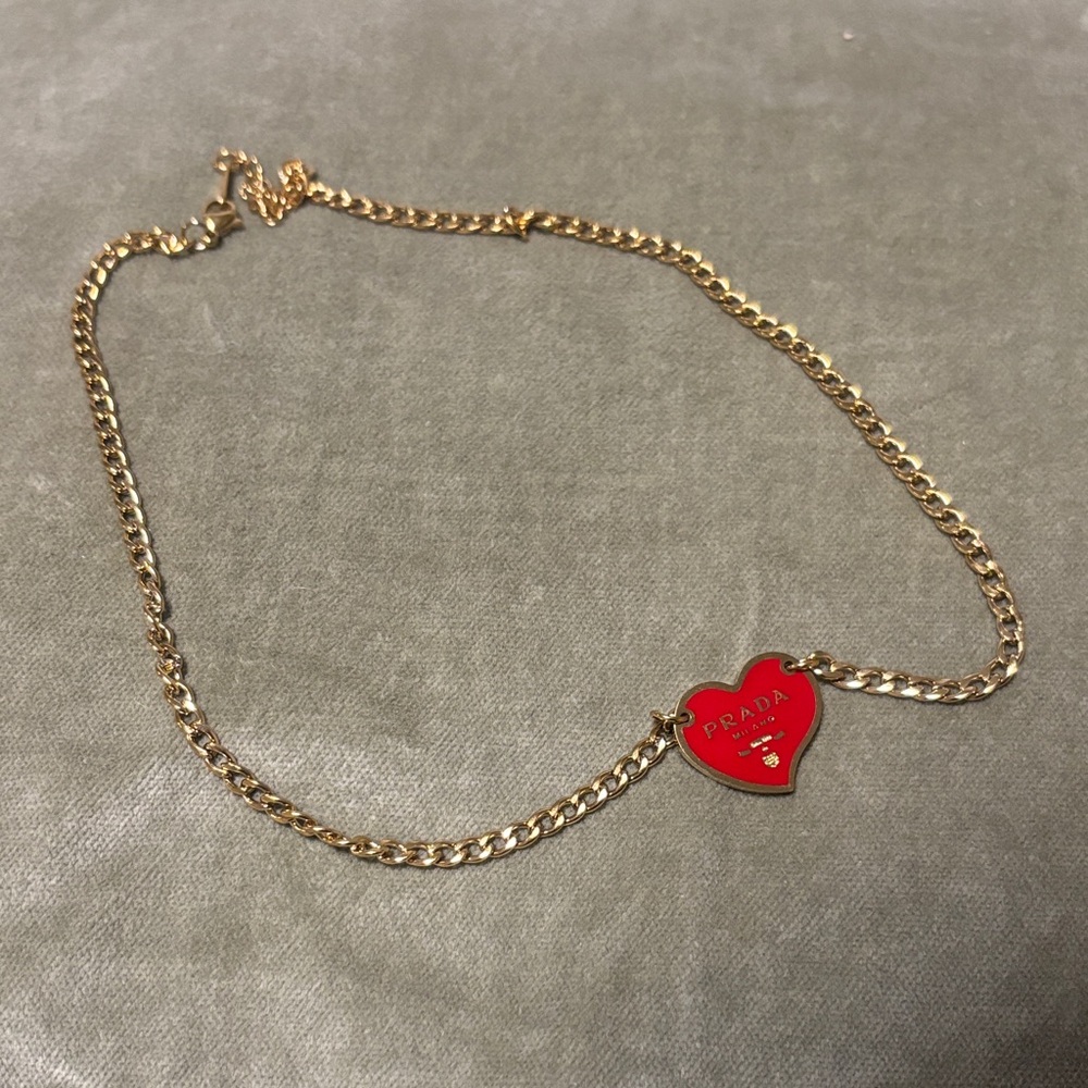 Prada Gold Necklace with Red Heart Pendant